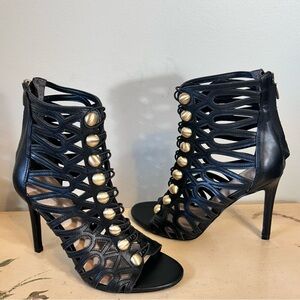 GUESS Black Faux Leather Gold Button Caged Zip  Back Heel Ankle Sandals Perlina